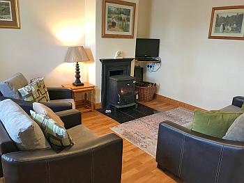 Wohnbereich mit offenem Kamin